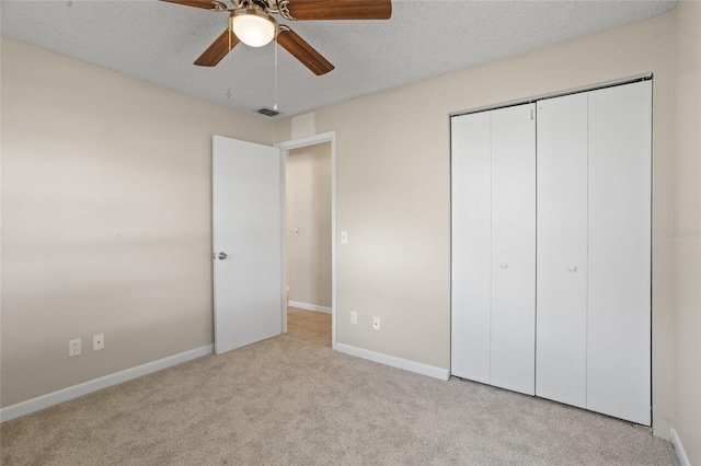 110 Rabun Ct, Sanford, FL 32773 - unfurnished bedroom with carpet flooring, a closet, a ceiling fan, and a textured ceiling