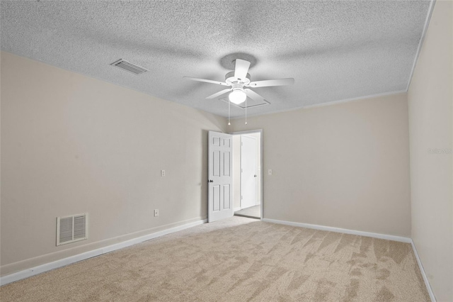 110 Rabun Ct, Sanford, FL 32773 - carpeted spare room featuring a ceiling fan, a textured ceiling, and attic access
