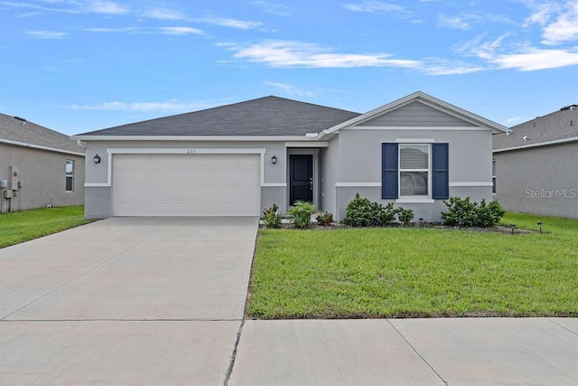 232 Summerlin Loop, Haines City, FL 33844 - single story home featuring an attached garage, stucco siding, driveway, and a front yard