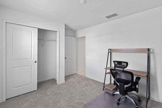 232 Summerlin Loop, Haines City, FL 33844 - carpeted home office featuring a textured ceiling and baseboards
