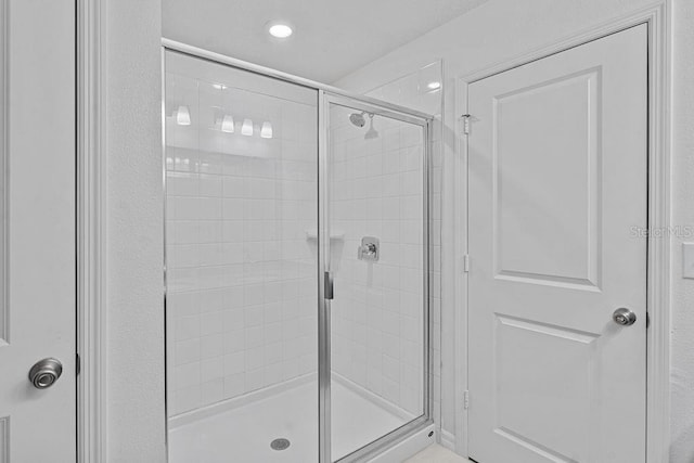 232 Summerlin Loop, Haines City, FL 33844 - bathroom with a stall shower and recessed lighting