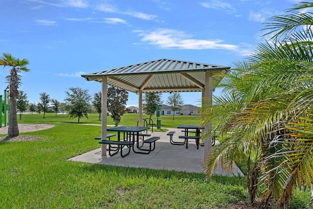 232 Summerlin Loop, Haines City, FL 33844 - view of property's community with a gazebo, a lawn, and a patio area