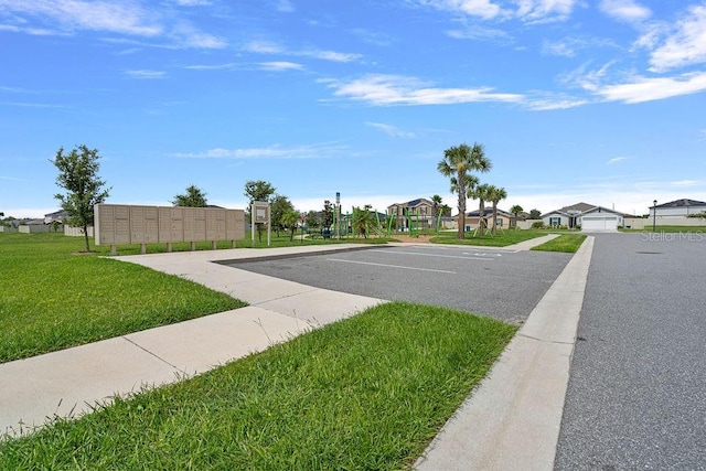 232 Summerlin Loop, Haines City, FL 33844 - view of asphalt road with sidewalks and a residential view