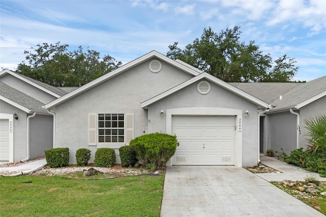 2404 SW 20th Ter, Ocala, FL 34471 - single story home with a garage, stucco siding, concrete driveway, a front lawn, and a shingled roof