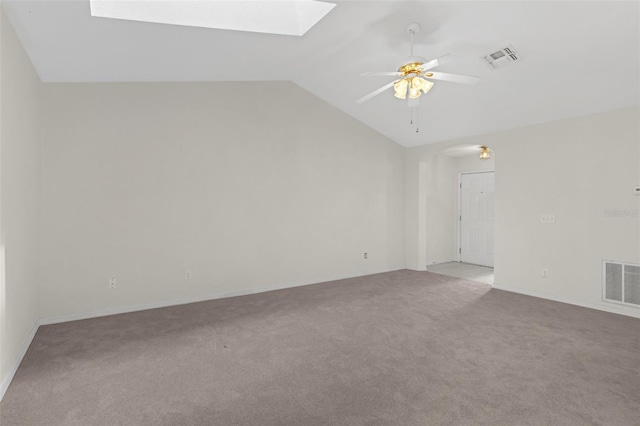 2404 SW 20th Ter, Ocala, FL 34471 - carpeted empty room with a skylight, a ceiling fan, and vaulted ceiling