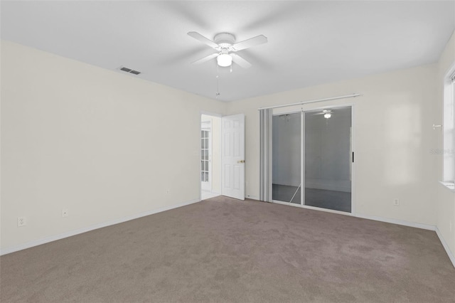 2404 SW 20th Ter, Ocala, FL 34471 - spare room featuring ceiling fan and carpet floors