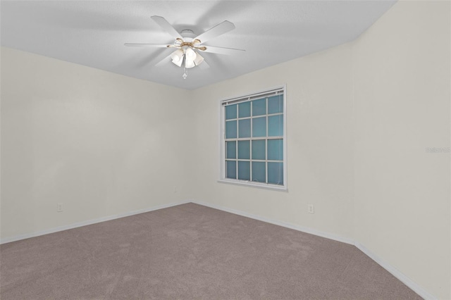 2404 SW 20th Ter, Ocala, FL 34471 - carpeted spare room with ceiling fan and baseboards