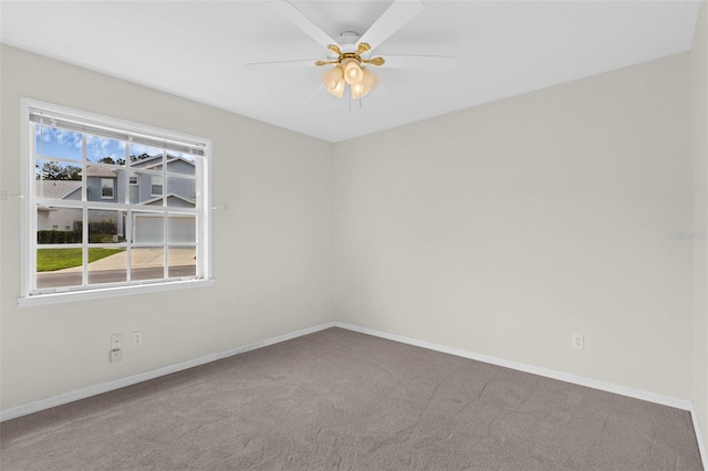 2404 SW 20th Ter, Ocala, FL 34471 - carpeted spare room with baseboards and ceiling fan
