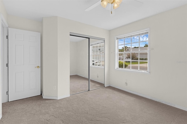 2404 SW 20th Ter, Ocala, FL 34471 - unfurnished bedroom featuring carpet floors, a closet, and ceiling fan