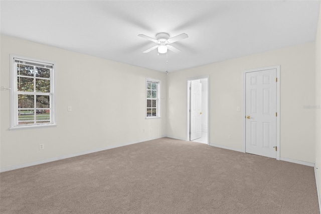 2404 SW 20th Ter, Ocala, FL 34471 - unfurnished bedroom featuring multiple windows, carpet flooring, and ensuite bathroom