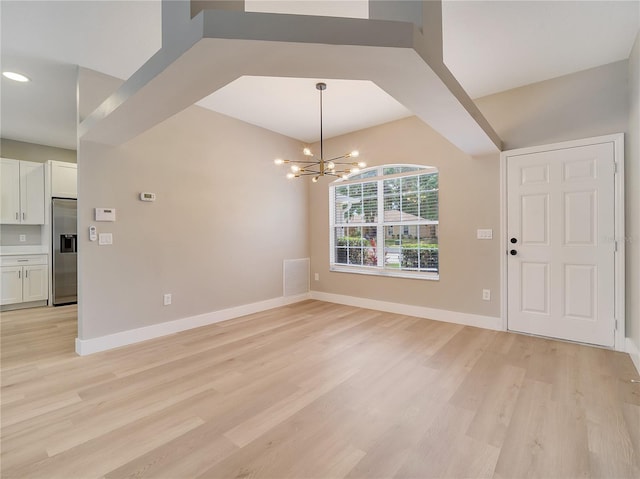2823 NE 24th Pl, Ocala, FL 34470 - entrance foyer featuring a chandelier, light wood finished floors, and recessed lighting