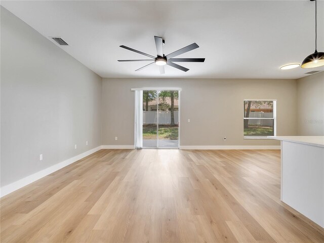 2823 NE 24th Pl, Ocala, FL 34470 - empty room with a ceiling fan and light wood-type flooring