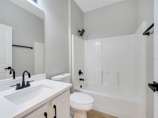 2823 NE 24th Pl, Ocala, FL 34470 - bathroom featuring vanity, shower / bathtub combination, and wood finished floors