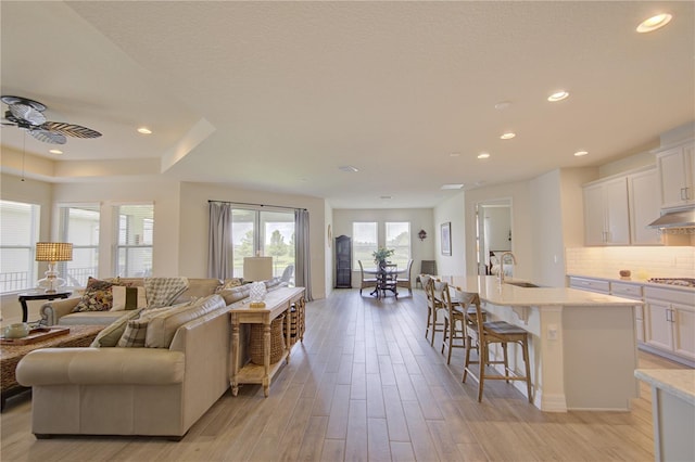 1774 Pasture Loop, Oviedo, FL 32765 - living area featuring ceiling fan, recessed lighting, and light wood-style floors