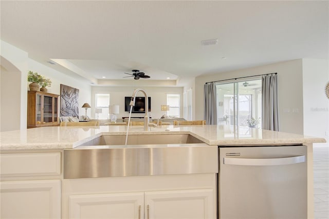 1774 Pasture Loop, Oviedo, FL 32765 - kitchen featuring stainless steel dishwasher, open floor plan, light stone counters, ceiling fan, and recessed lighting