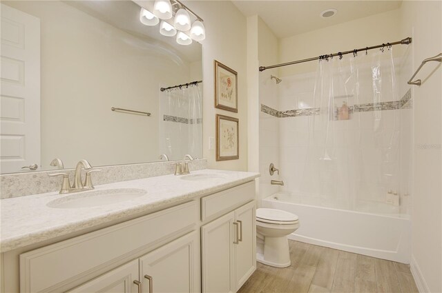 1774 Pasture Loop, Oviedo, FL 32765 - full bathroom with wood finished floors, double vanity, and shower / bath combo