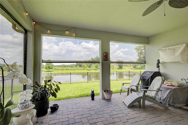 1774 Pasture Loop, Oviedo, FL 32765 - fenced backyard with a water view, ceiling fan, a patio, and grilling area