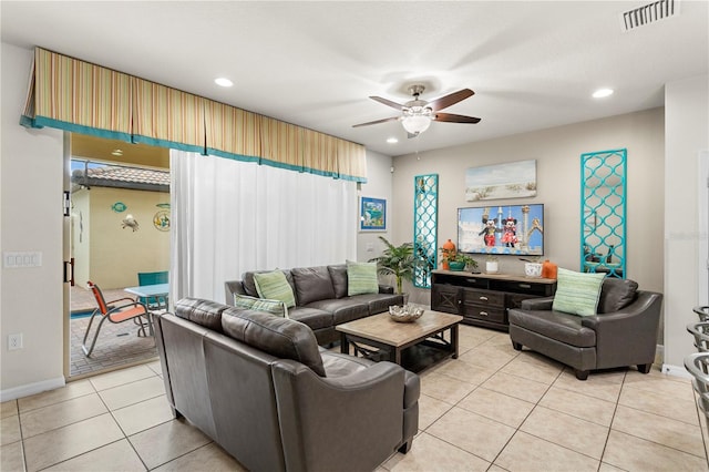 1909 Majorca Dr, Kissimmee, FL 34747 - living area with ceiling fan, light tile patterned floors, and recessed lighting