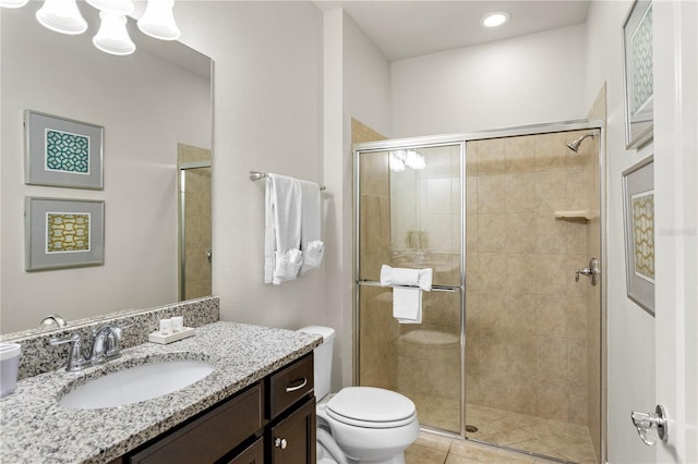 1909 Majorca Dr, Kissimmee, FL 34747 - bathroom featuring vanity, a shower stall, tile patterned flooring, and recessed lighting