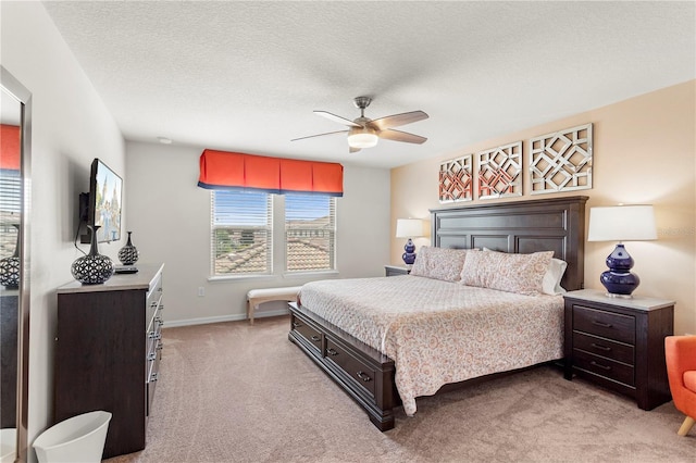 1909 Majorca Dr, Kissimmee, FL 34747 - bedroom featuring light carpet, ceiling fan, and a textured ceiling