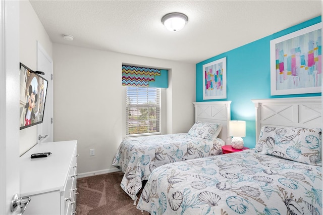 1909 Majorca Dr, Kissimmee, FL 34747 - bedroom with dark carpet and a textured ceiling