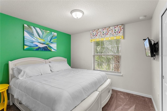 1909 Majorca Dr, Kissimmee, FL 34747 - bedroom with carpet floors and a textured ceiling