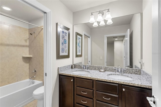 1909 Majorca Dr, Kissimmee, FL 34747 - full bathroom featuring double vanity and bathtub / shower combination