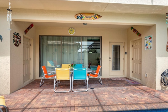 1909 Majorca Dr, Kissimmee, FL 34747 - view of patio featuring outdoor dining area