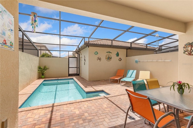 1909 Majorca Dr, Kissimmee, FL 34747 - view of pool with a patio area, a lanai, and outdoor dining space