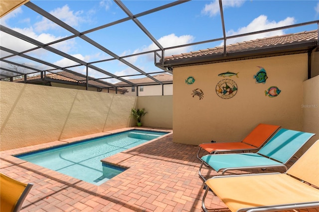 1909 Majorca Dr, Kissimmee, FL 34747 - view of pool with a patio area and glass enclosure