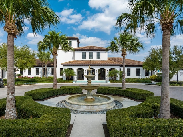 1909 Majorca Dr, Kissimmee, FL 34747 - view of front of house with a tiled roof and stucco siding