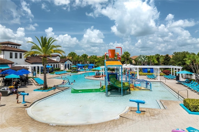 1909 Majorca Dr, Kissimmee, FL 34747 - community playground with a water play area, a community pool, and a patio area