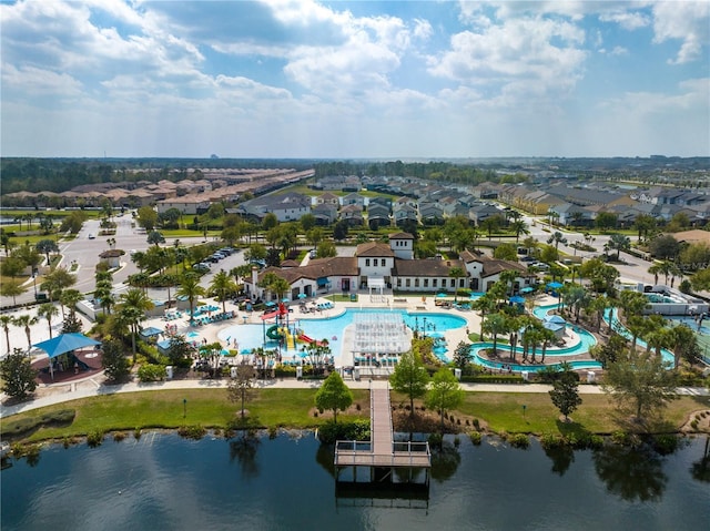 1909 Majorca Dr, Kissimmee, FL 34747 - aerial perspective of suburban area featuring a pool area and a large body of water