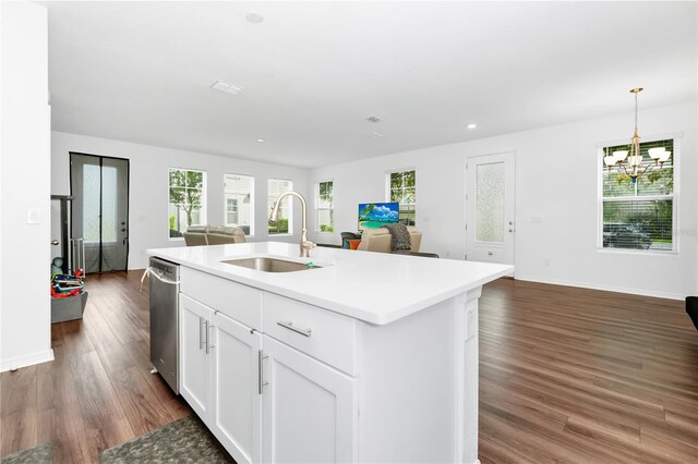 812 Benoi Dr, Davenport, FL 33896 - kitchen featuring open floor plan, healthy amount of natural light, a chandelier, stainless steel dishwasher, and recessed lighting