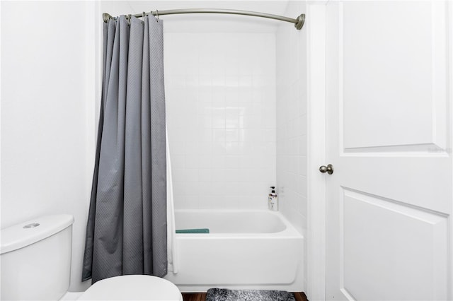 812 Benoi Dr, Davenport, FL 33896 - bathroom featuring toilet and shower / tub combo