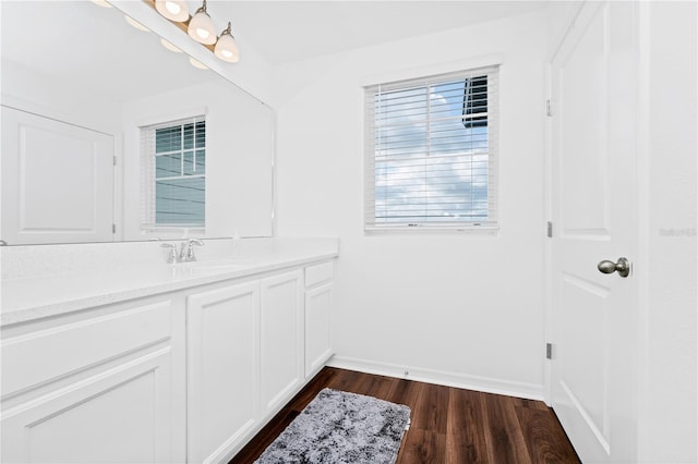 812 Benoi Dr, Davenport, FL 33896 - bathroom featuring vanity and wood finished floors