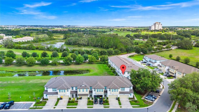 812 Benoi Dr, Davenport, FL 33896 - aerial view of a large body of water and a tree filled landscape
