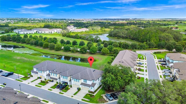 812 Benoi Dr, Davenport, FL 33896 - aerial perspective of suburban area with a nearby body of water and a tree filled landscape