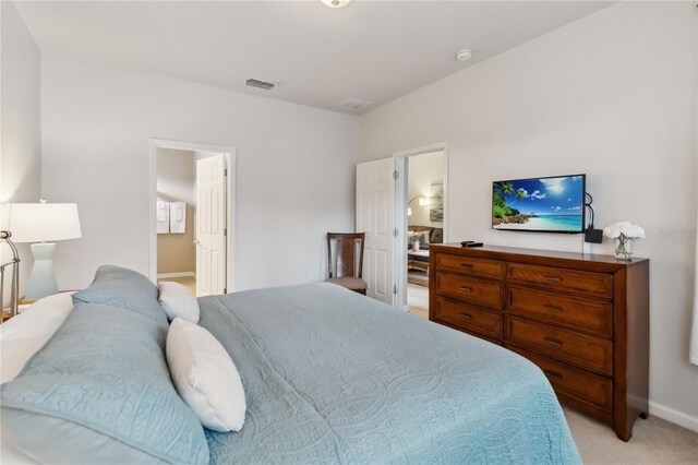 2616 Bowring St, Kissimmee, FL 34747 - bedroom featuring light carpet and baseboards