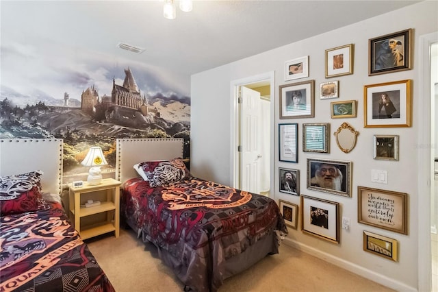 2616 Bowring St, Kissimmee, FL 34747 - carpeted bedroom featuring baseboards and ensuite bathroom