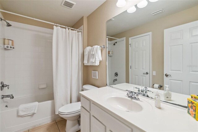 2616 Bowring St, Kissimmee, FL 34747 - full bathroom with vanity, shower / bath combination with curtain, and tile patterned floors