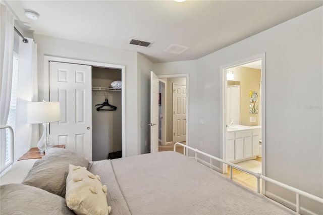 2616 Bowring St, Kissimmee, FL 34747 - bedroom with a closet and ensuite bathroom