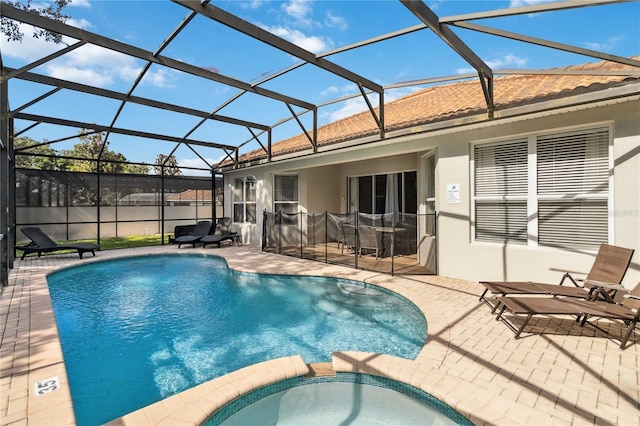 2616 Bowring St, Kissimmee, FL 34747 - view of pool featuring a patio, a pool with connected hot tub, and a lanai