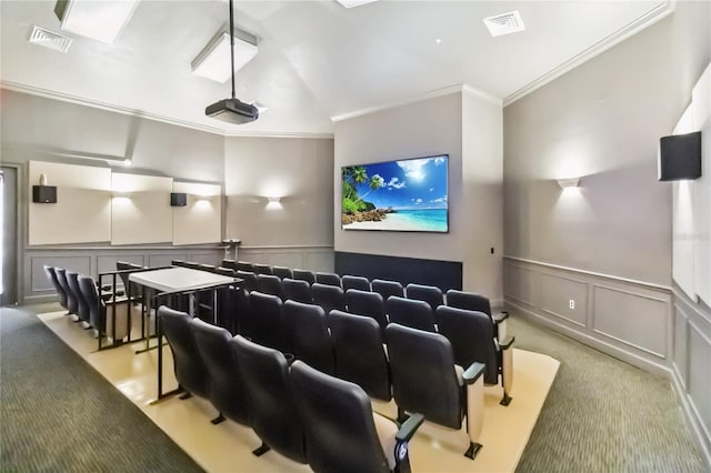 2616 Bowring St, Kissimmee, FL 34747 - cinema room with a decorative wall, carpet flooring, crown molding, and a wainscoted wall