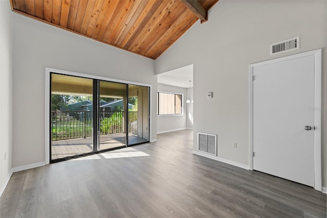 6120 Peregrine Ave Unit A08-2, Orlando, FL 32819 - spare room featuring plenty of natural light, wood finished floors, a wood ceiling with exposed beams, and high vaulted ceiling