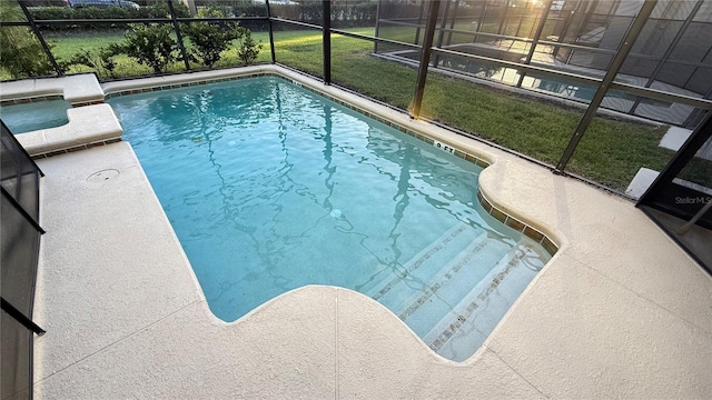 8940 Sugar Palm Rd, Kissimmee, FL 34747 - swimming pool featuring a lanai, a lawn, and a patio