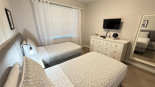 8940 Sugar Palm Rd, Kissimmee, FL 34747 - carpeted bedroom featuring baseboards