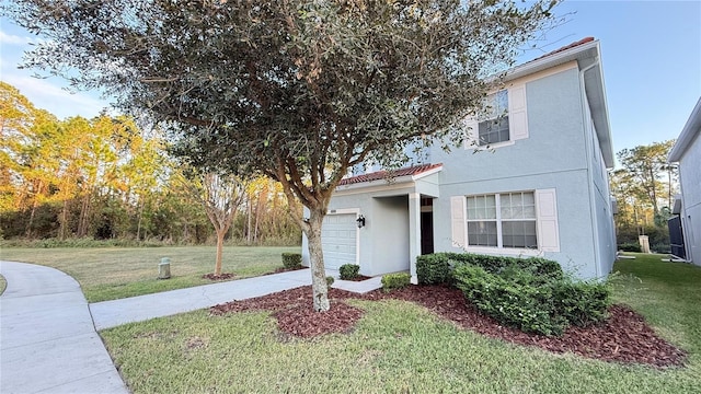 8940 Sugar Palm Rd, Kissimmee, FL 34747 - view of front of property with stucco siding, a garage, a front lawn, and driveway