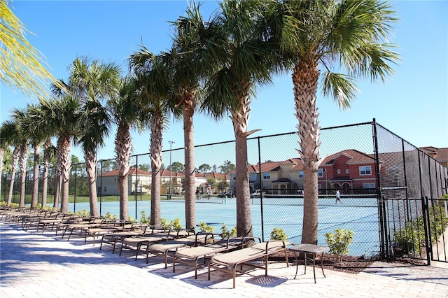8940 Sugar Palm Rd, Kissimmee, FL 34747 - view of property's community with a tennis court