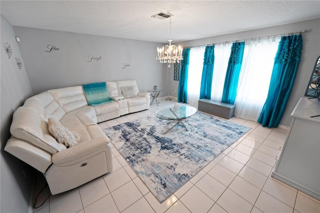 543 Silver Crse, Ocala, FL 34472 - living area featuring a textured ceiling, a chandelier, and light tile patterned flooring